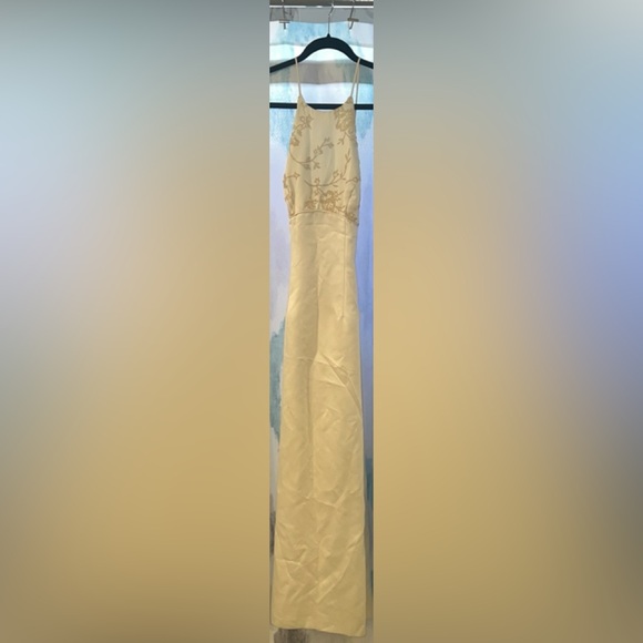 Ivory/cream dress with spaghetti straps and a zipper in the back. Gently used. - Picture 2 of 11
